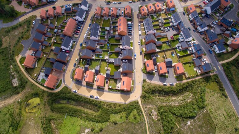 Drone shot of housing development that is heated by ground source heat pumps.