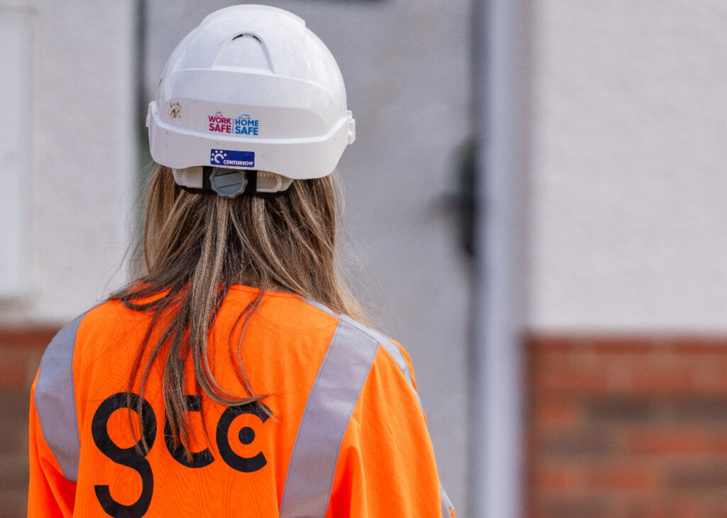 A GTC employee on a GTC resident visit for gas meter maintenance