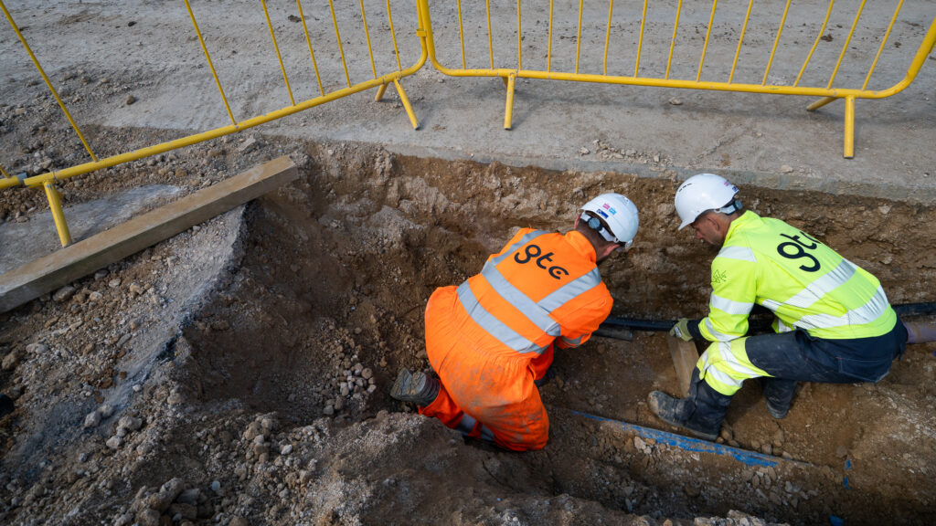 GTC workers inspect pipe work that's part of a multi-utility infrastructure